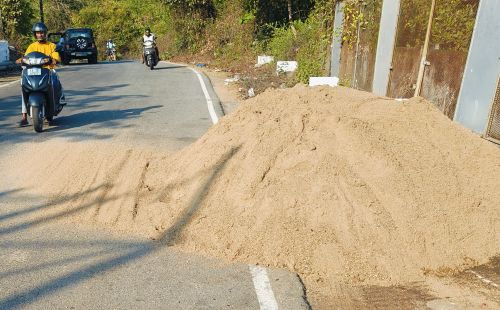 Don't go to the bridge.. Annoying for riders: Illegal sand swallows half the road!