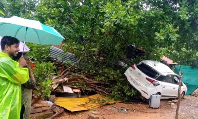 Car crashes into shop damages bike injures woman